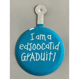 Vintage I am a edjoocatid graduit! graduation humor pinback button pin tab